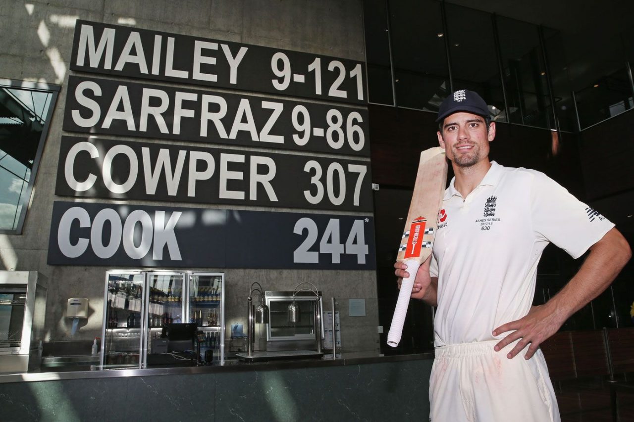 Alastair Cook Poses With His Name Up On The Wall At The MCG's