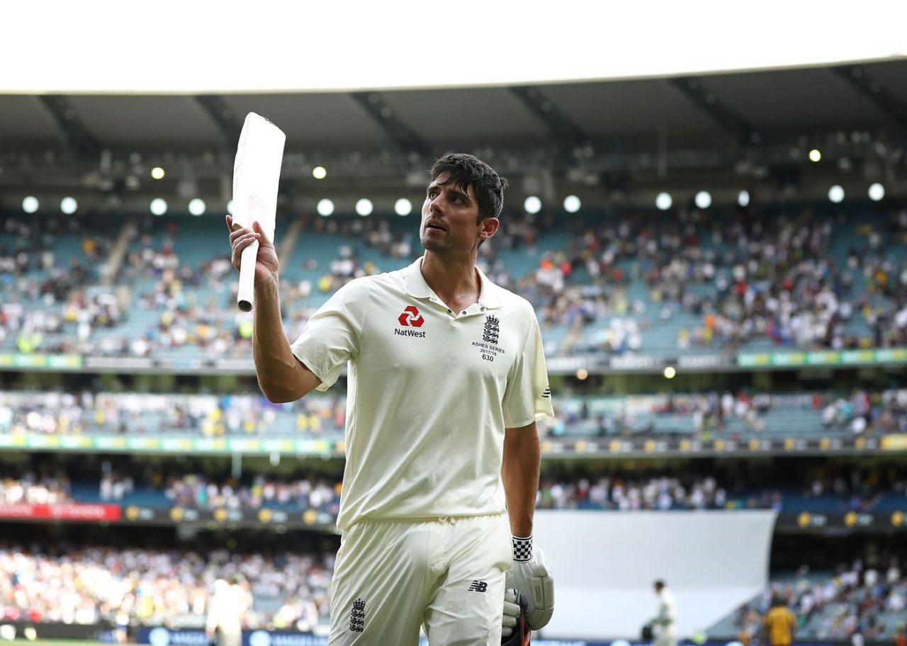 Alastair Cook Raising His Bat For Reaching The 100