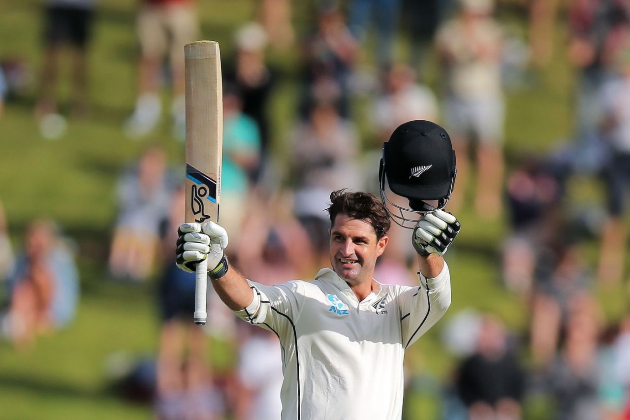 Colin De Grandhomme Raises His Bat After Notching Up His Century