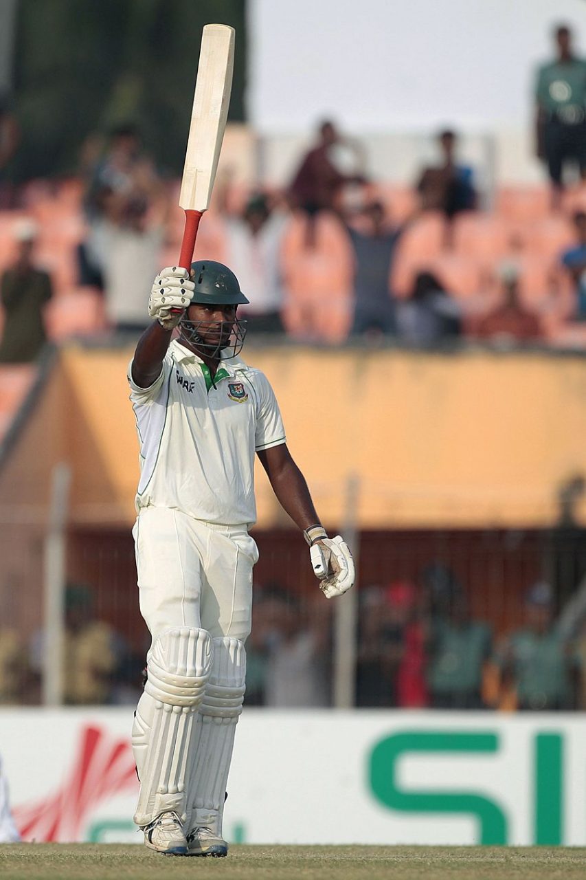 Abul Hasan Raising His Bat After Reaching 100