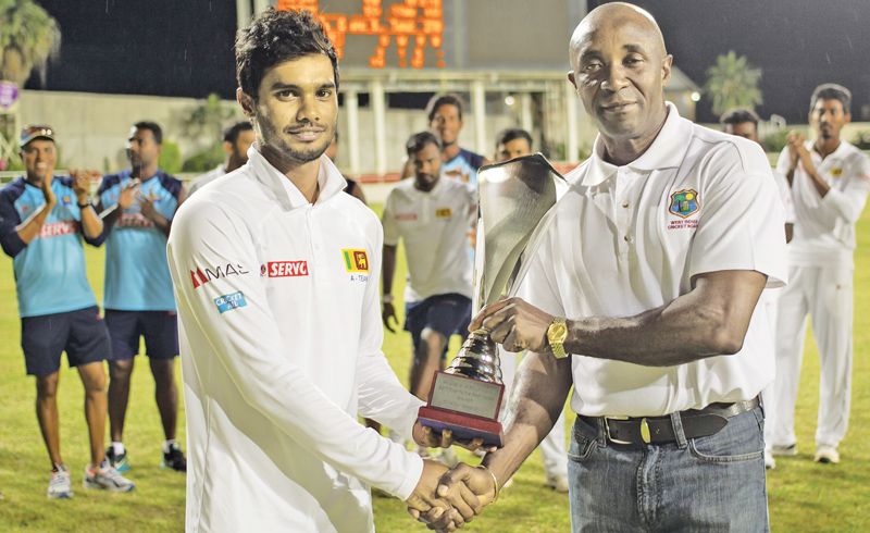Dhananjaya De Silva Receives The Unofficial Test Series Trophy