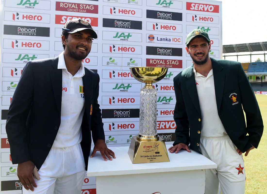Dinesh Chandimal And Graeme Cremer With Test Series Trophy
