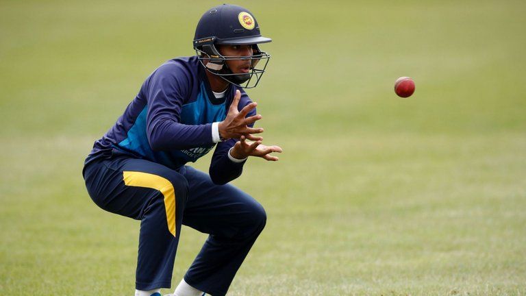Kusal Perera Prepares To Take A Catch During A Practice Session