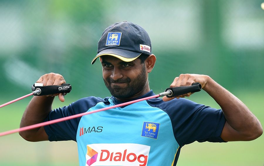 Lahiru Thirimanne Stretches Out During Training