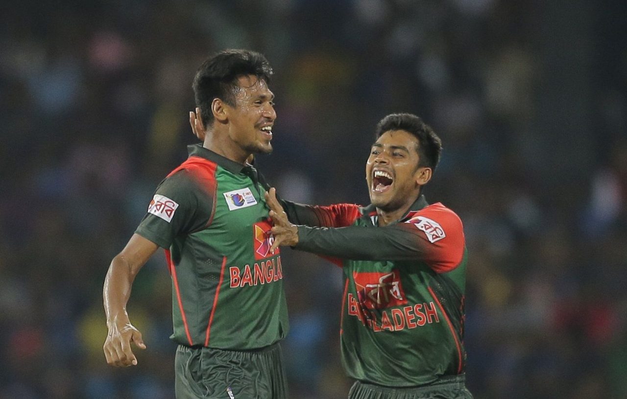 Mustafizur Rahman And Mehidy Hasan Celebrate A Wicket