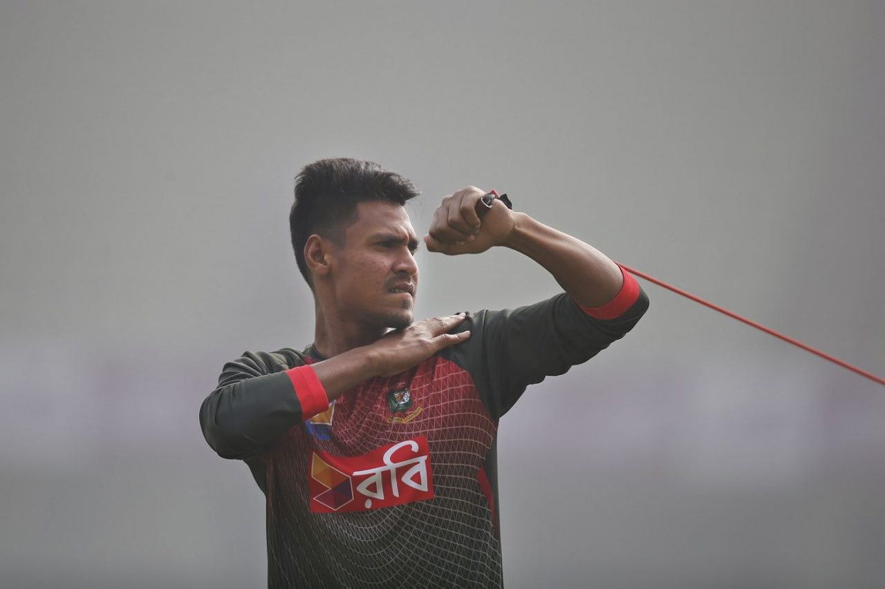 Mustafizur Rahman Stretches Out During Training