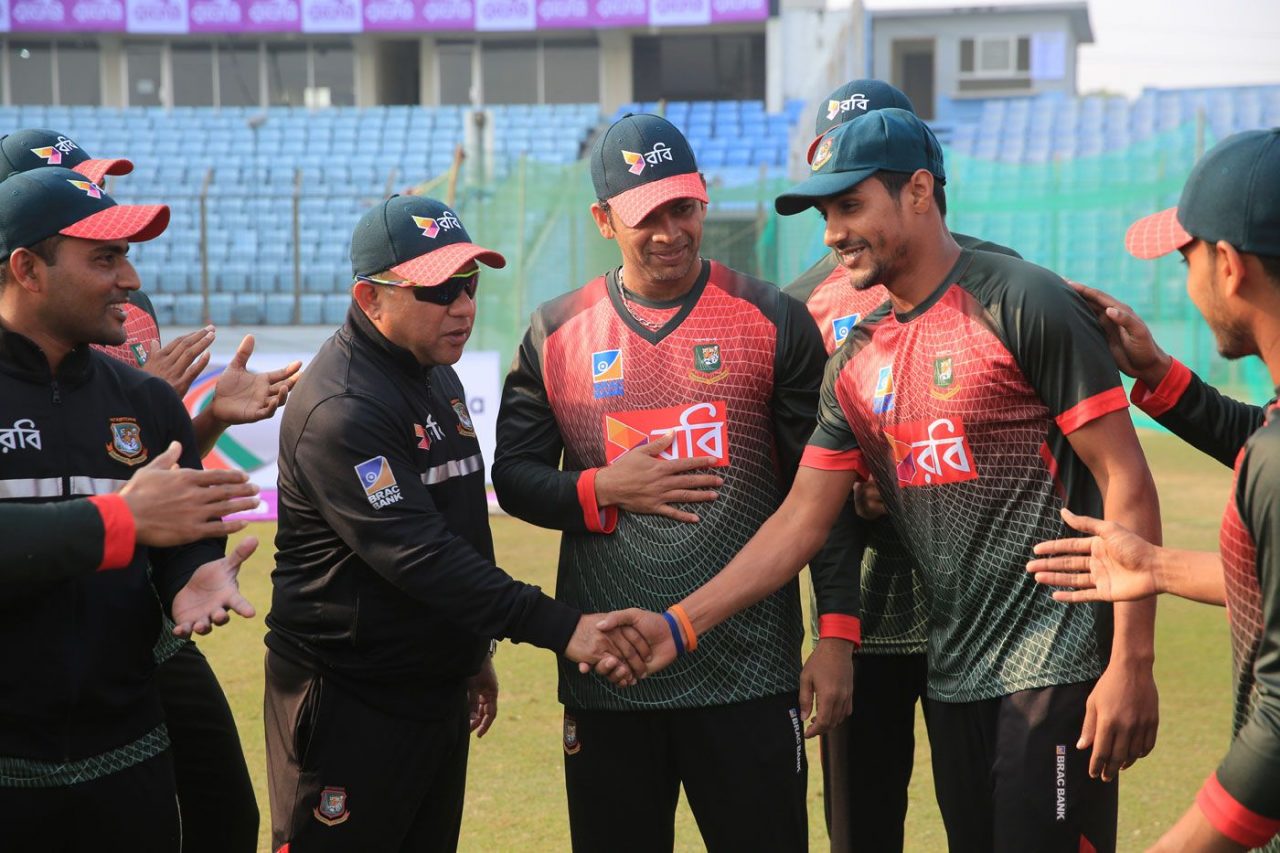 Sunzamul Islam Receiving His Test Cap From Khaled Mahmud